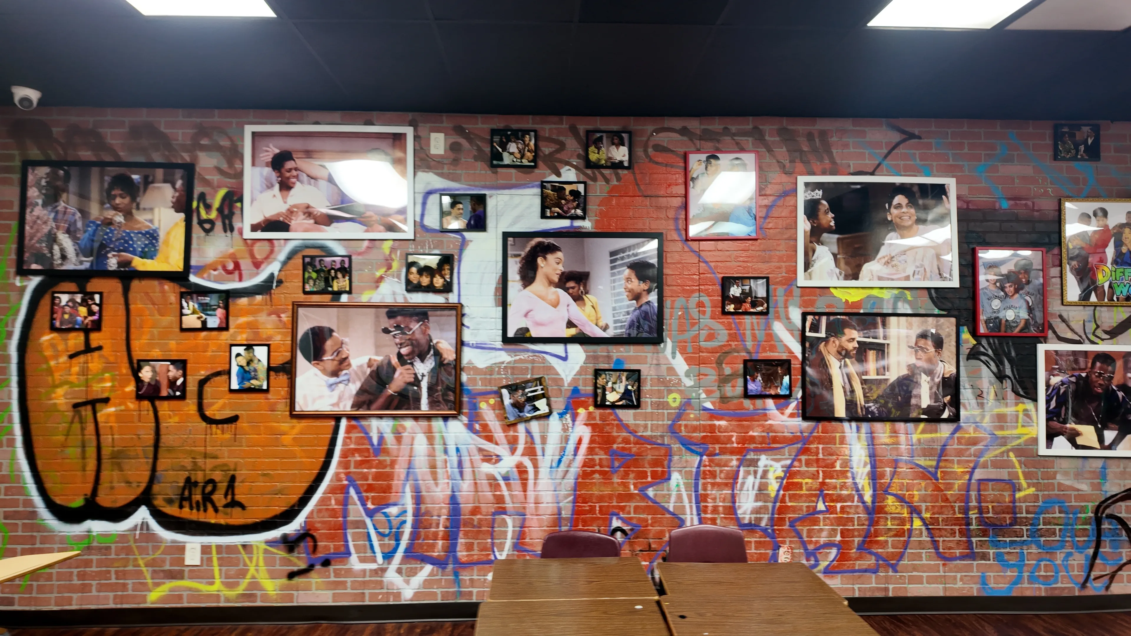 The Bando restaurant interior wall with graffiti art and Black history photographs