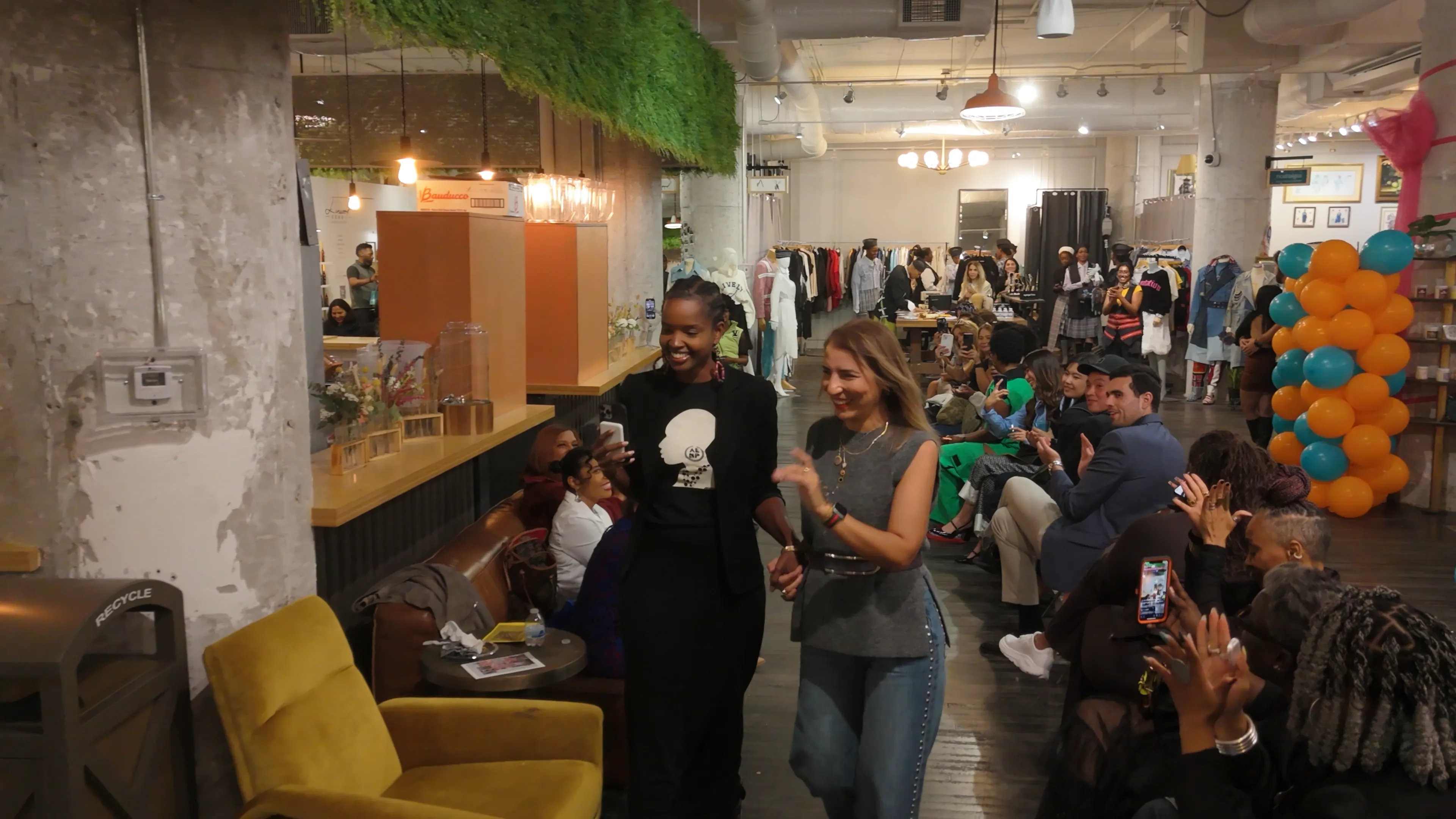 Aysegul Ikna with guests celebrating the fashion show launch at Ponce City Market